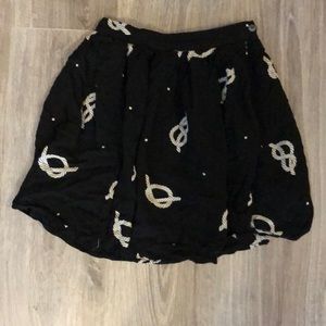 Aritzia black pleated skirt